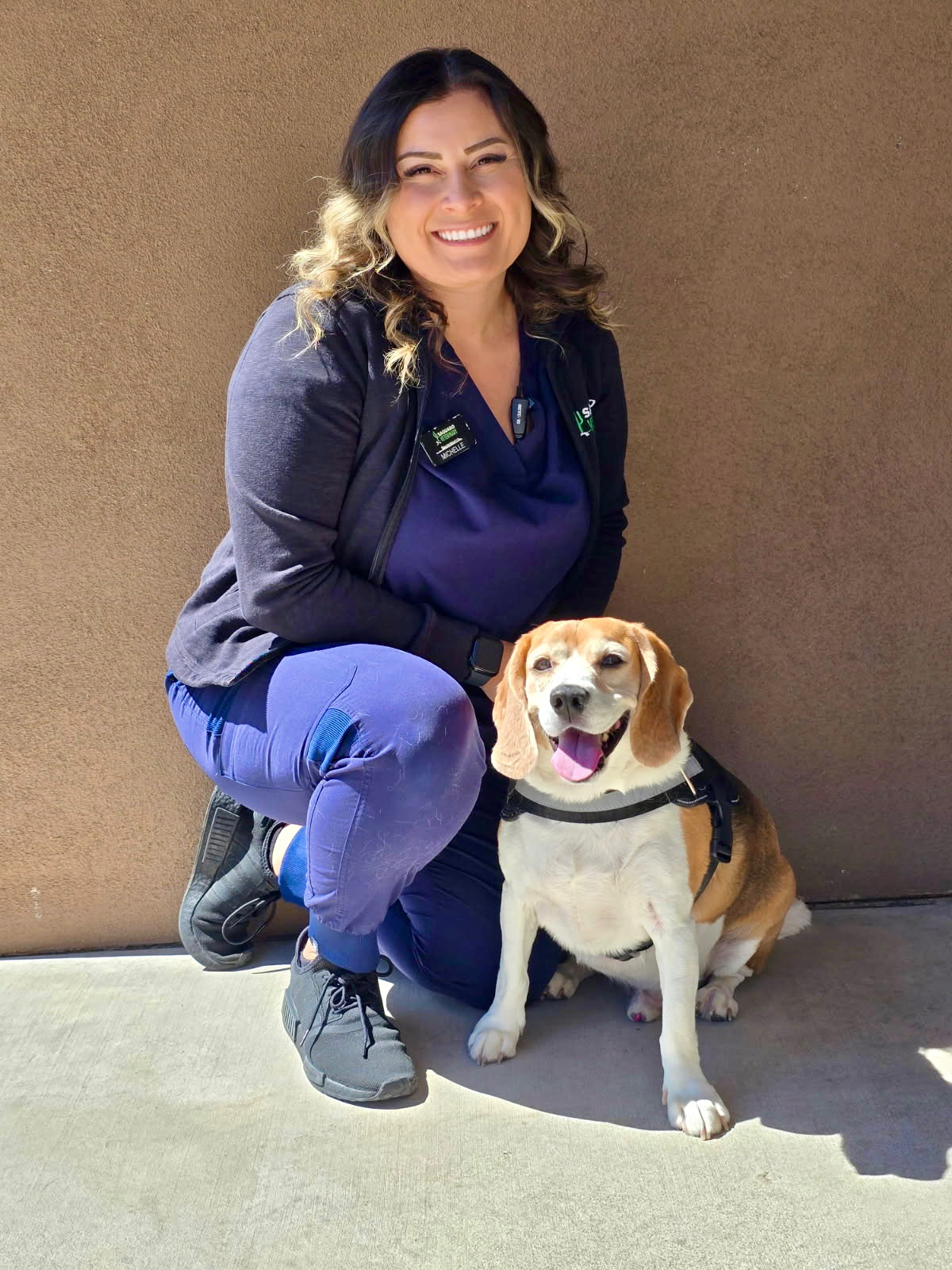 Photo of CSR Michelle with her Beagle